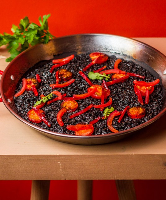 Spanish style black rice with chorizo and Azura grape tomatoes